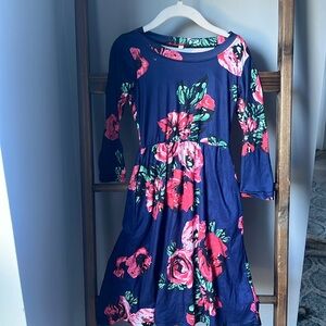 Cute floral long sleeved dress with pockets size XS